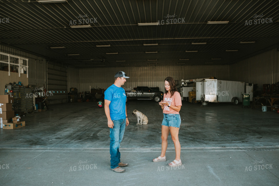 Farmer Talking to Wife in Farm Shop 6210