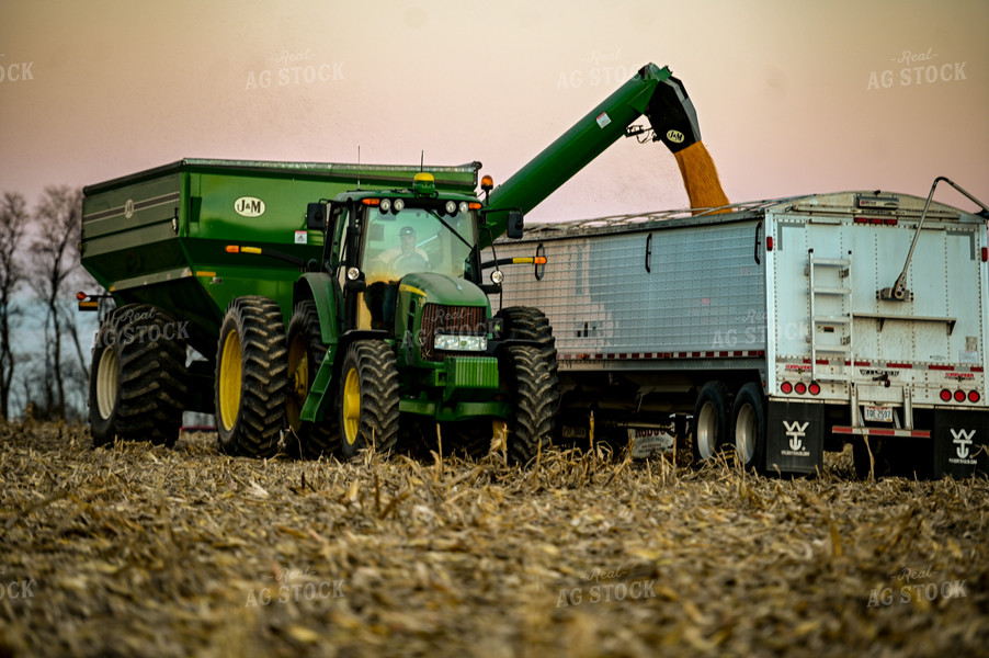 Grain Cart Unloading Corn into Semi 90040