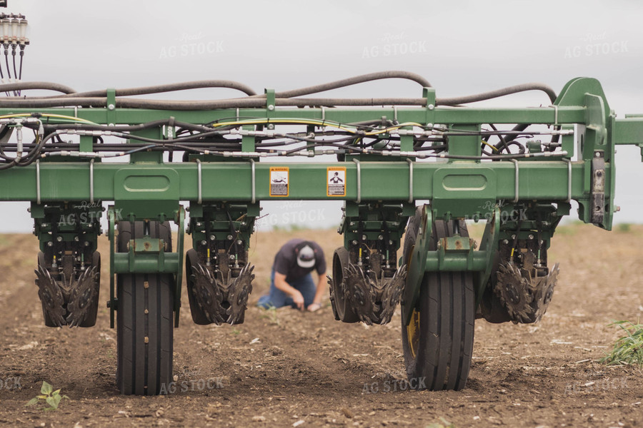 Planter in Field With Farmer 91003