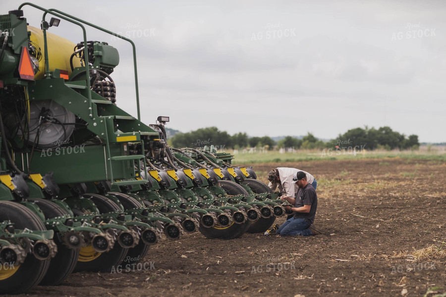 Planter in Field With Farmer 91005