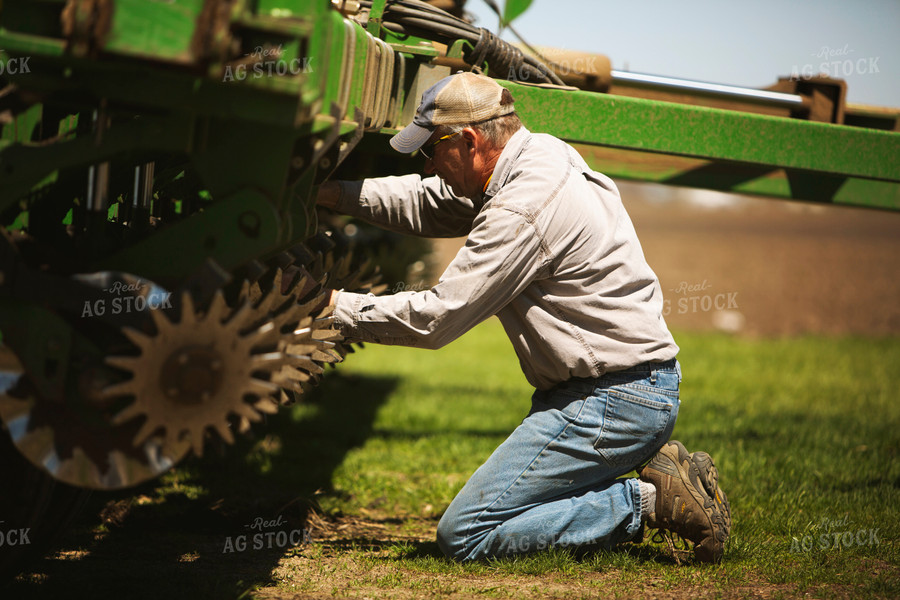 Farmer Working on Planter 6359