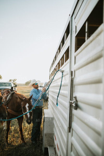 Rancher and Horse Near Livestock Trailer 6419