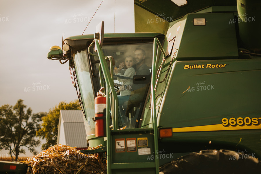 Farmer and Farm Kid in Combine 6589