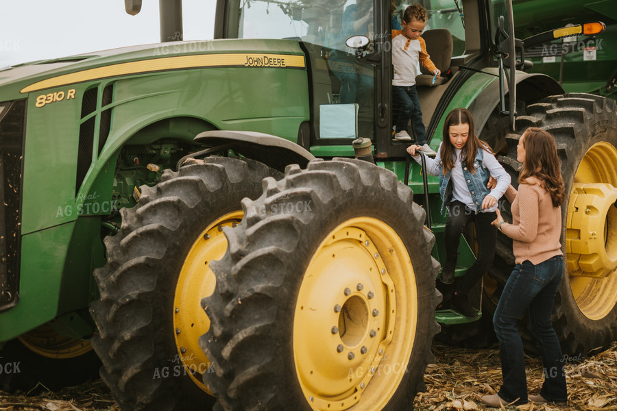 Farm Family Near Tractor 6598