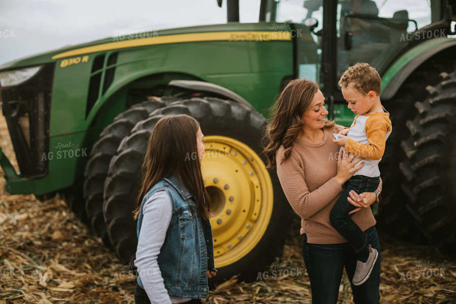 Farm Family Near Tractor 6600