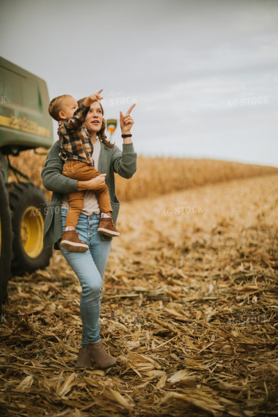 Farmer and Farm Kid in Field 6655