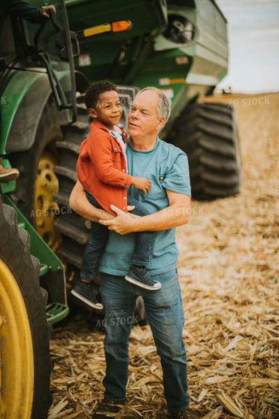 Farmer and Farm Kid in Field 6659