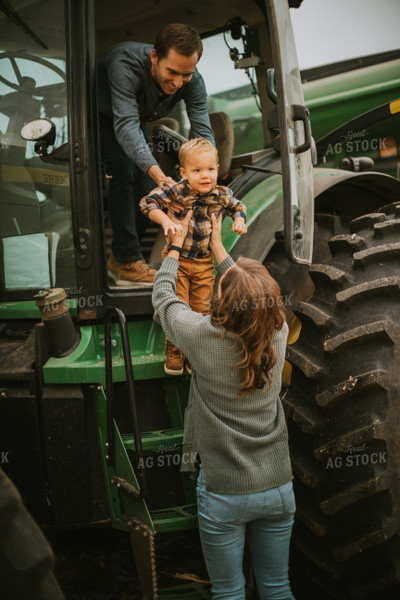 Farm Family Exiting Tractor 6666