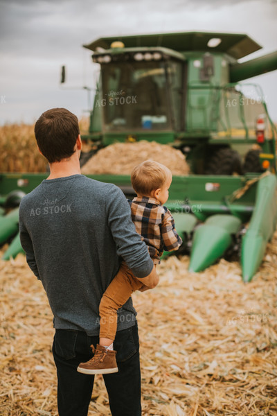 Farmer and Farm Kid in Field 6682