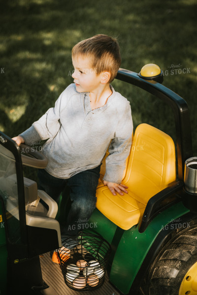 Farm Kid on Toy Gator 6808