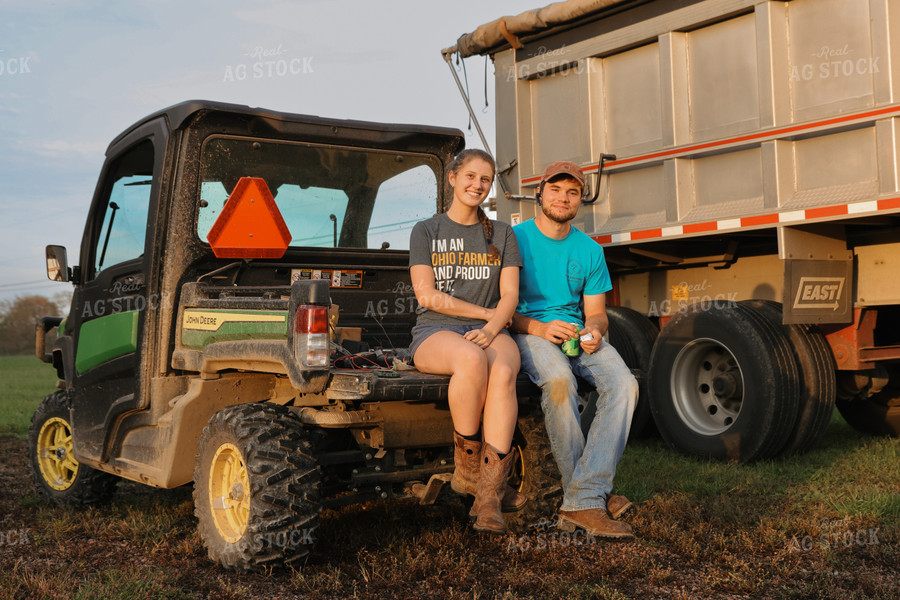 Farmers Sitting in Side By Side 52537