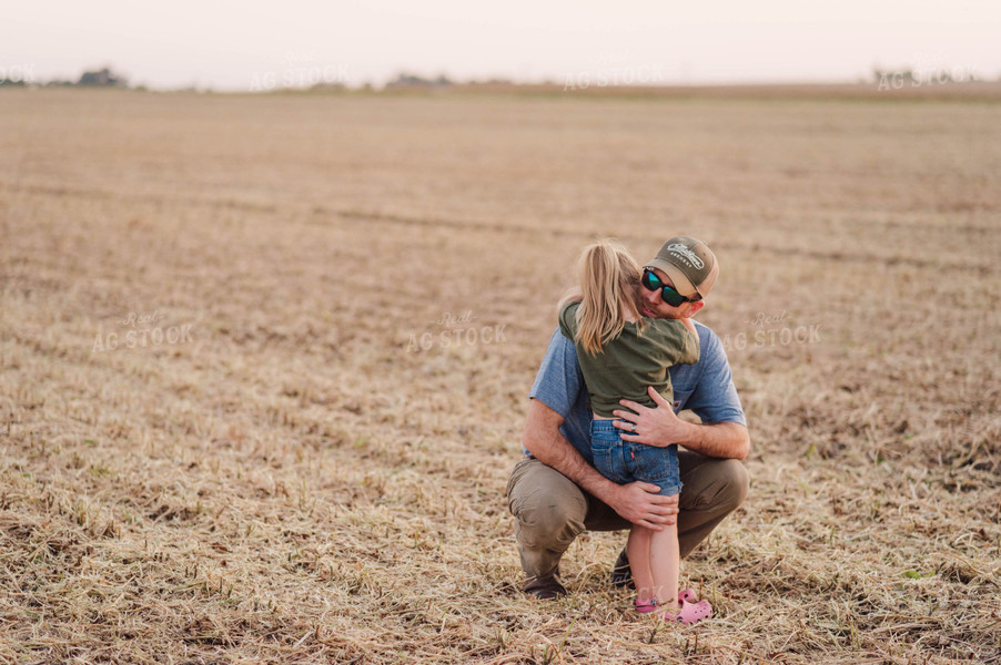 Farmer Giving Farm Kid Hug 115020