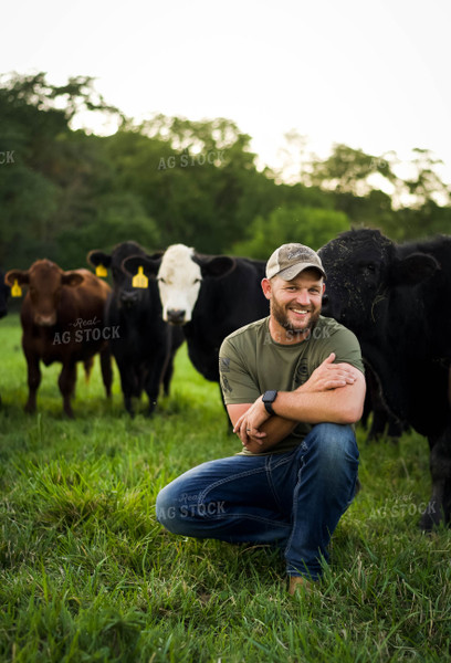 Farmer in Pasture with Cattle 115022