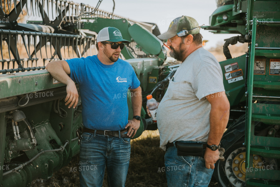 Farmers Talking Near Combine Head 7091