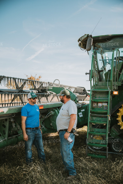 Farmers Talking Near Combine Head 7093