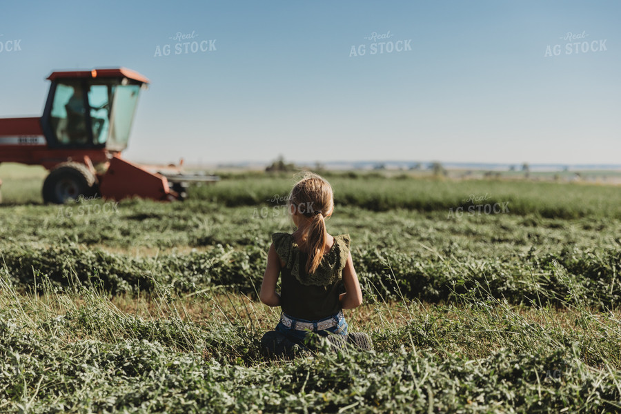 Farm Girl Sitting in Field 61111