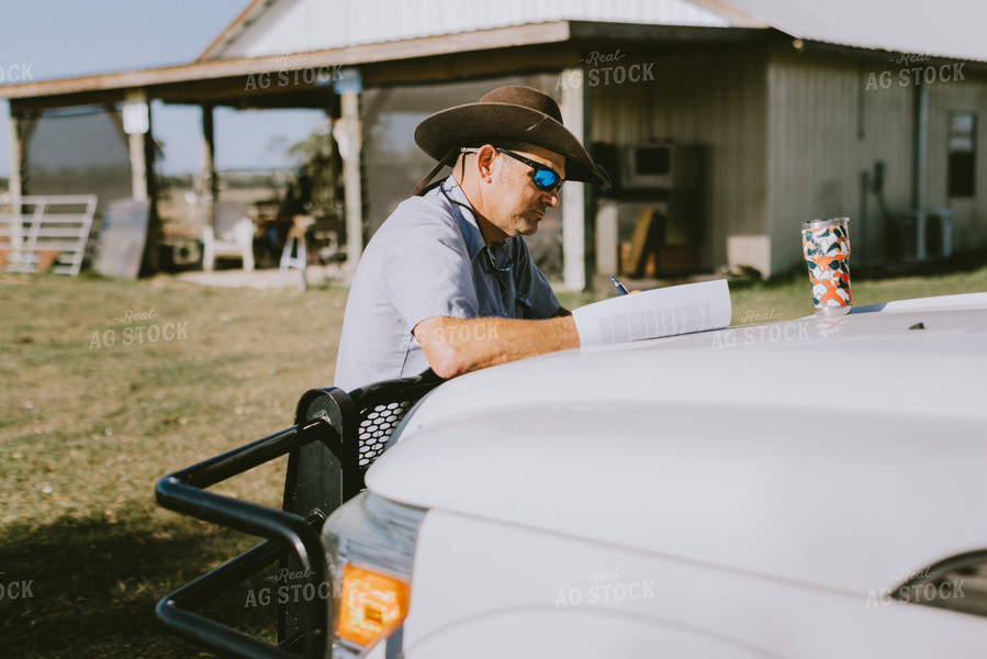 Rancher Writing on Paper 7319