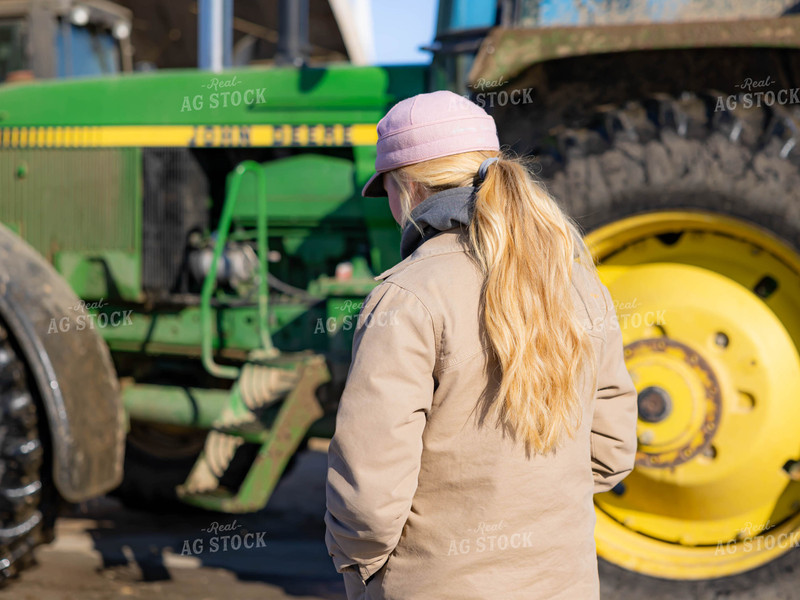 Rancher Walking Across Farm 70190