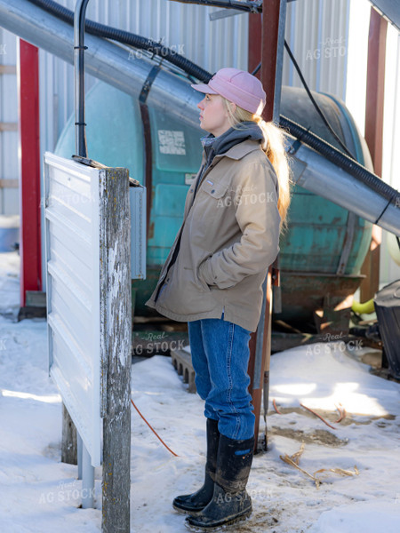 Rancher in Snowy Farmyard 70204