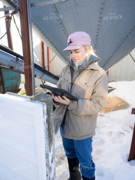 Rancher Looking at Tablet 70211