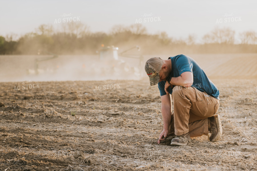 Farmer Touching Soil 7424