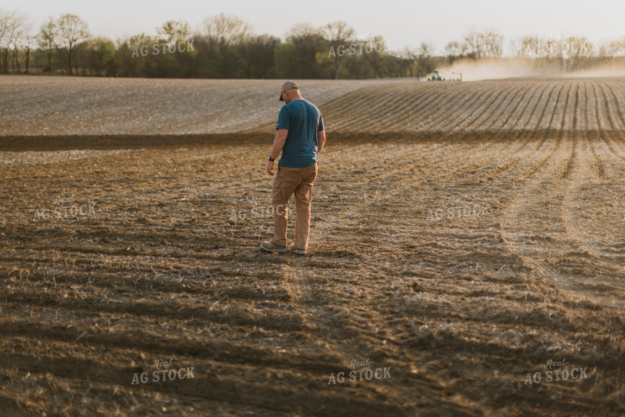 Farmer Walking in Field 7441