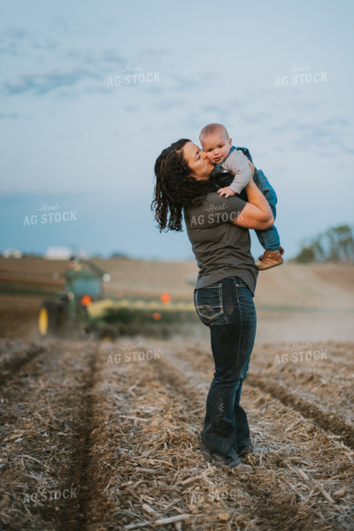 Farmer Playing with Farm Kid in Field 7470