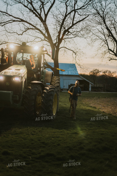 Farmer Walking Away From Tractor 7476