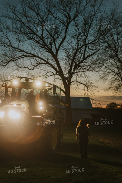 Farmer and Farm Kid Walking Towards Tractor 7479