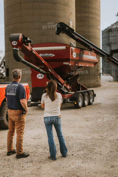 Farmers Talk While Delivering Seed 7600