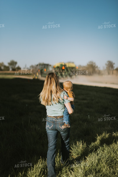 Farm Wife and Child Approach Tractor During Planting 7639