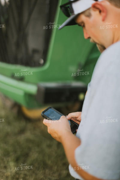 Farmer Using Phone 7776