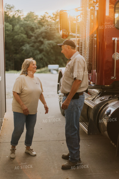 Farmers Talking by Semi Truck 7790