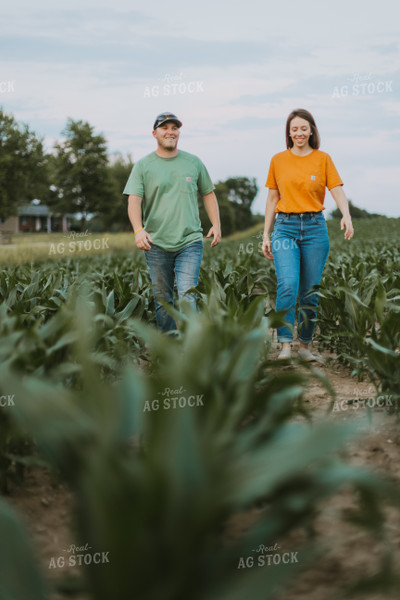 Farmers Scouting Corn Field 7835