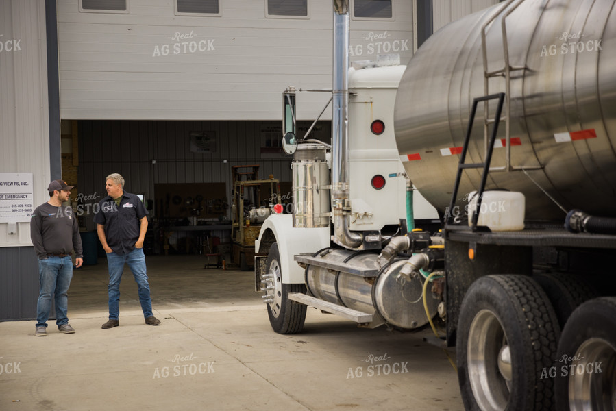 Retailers Talking by Fertilizer Truck 7899