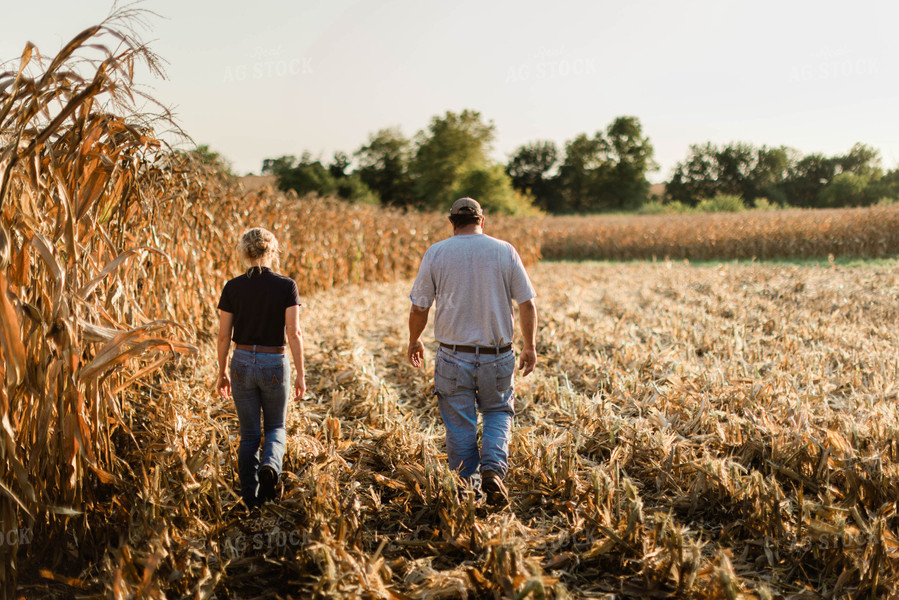Farmer and Agronomist Walking in Field 8269