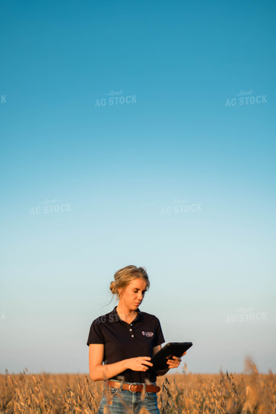 Female Agronomist on Tablet in Field 8326