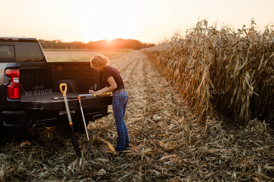 Female Agronomist Checking Corn 8344