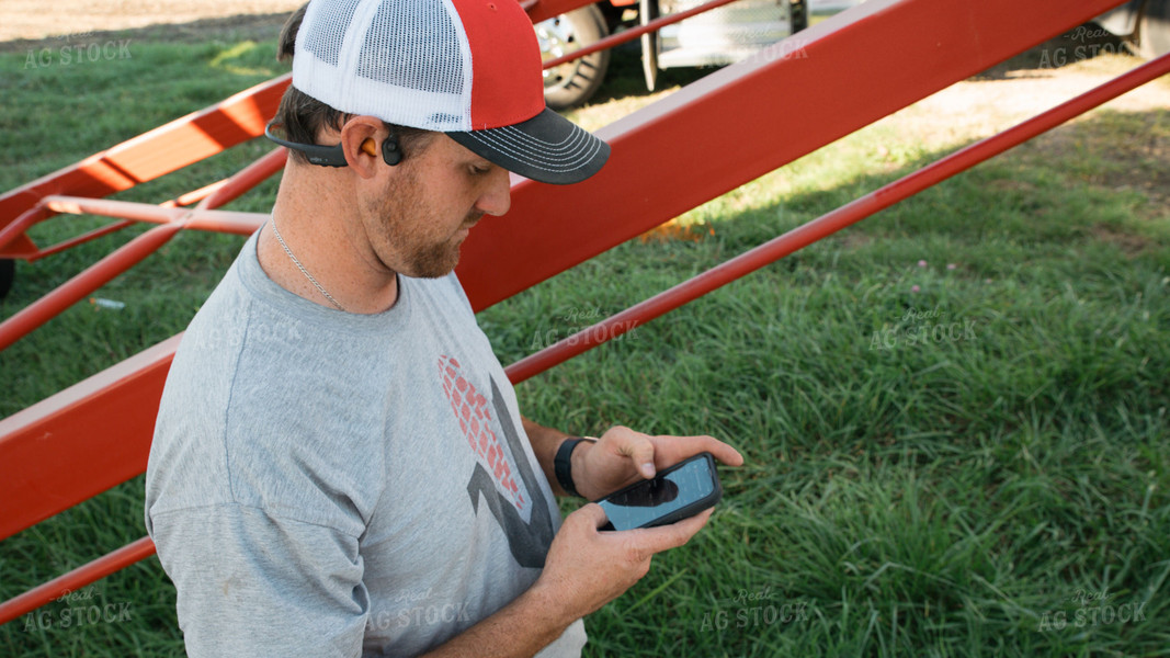 Farmer Using Phone 26087