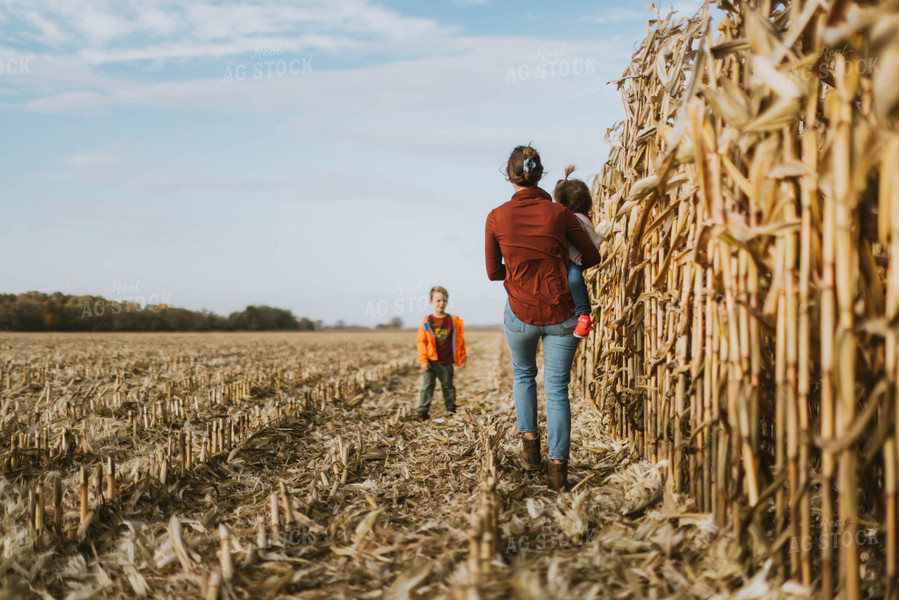 Female Farmer and Kids Checking Corn 8513