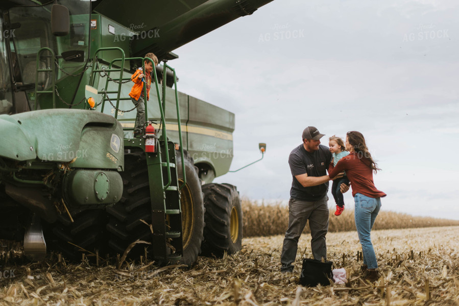 Farm Family Loading Kids into Combine 8564