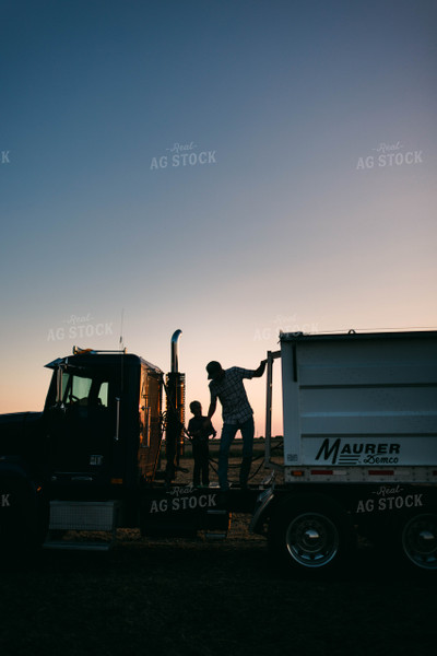 Farmer and Son Climbing on Semi Trailer 8650