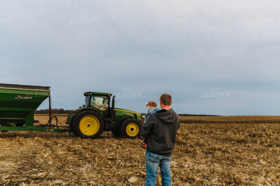 Farmer Holding Kid 115159