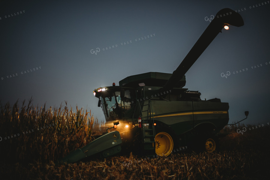 Combine Picking Corn with Lights On at Dusk 3406