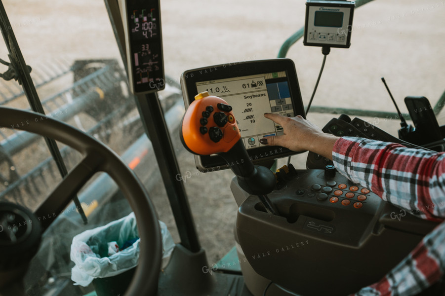 Female Farmer Driving Combine 3494