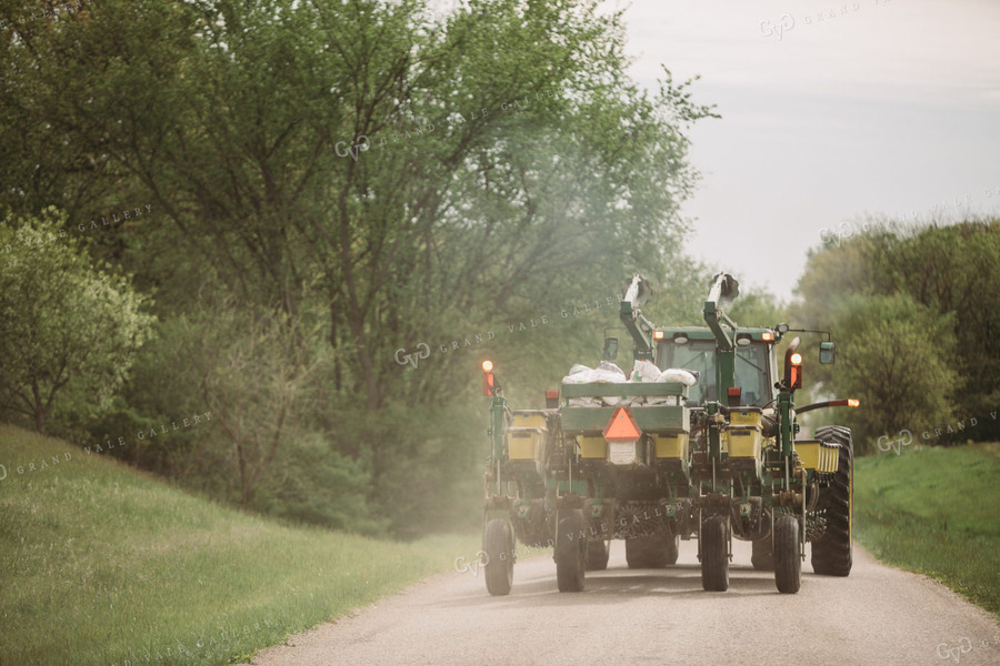 Tractor and Planter Driving Down Road 4011