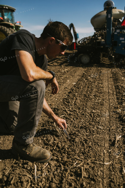 Farmer Checking Seed Depth 4112