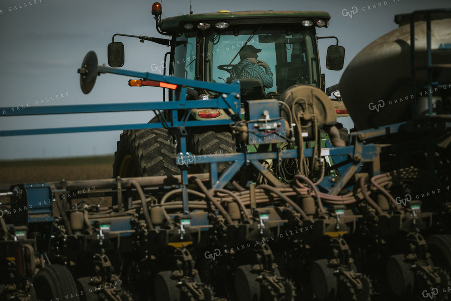 Farmer in Tractor Cab with Planter 4147