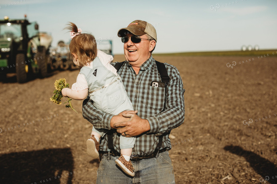 Farmer with Granddaughter 4189