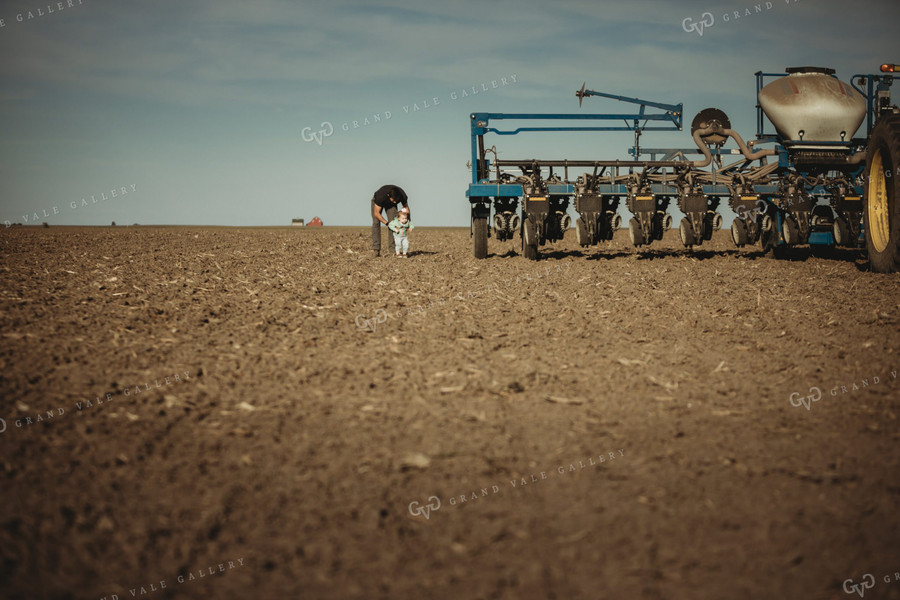 Farmer with Daughter and Planter 4204